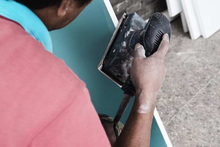 Floor scrubbing machine in use