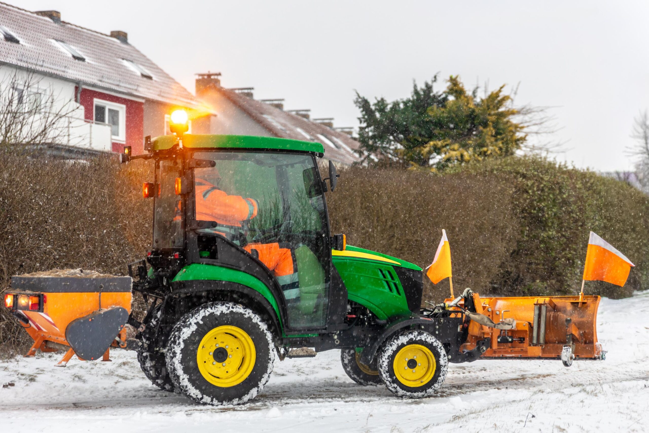 Snow plow clearing snow
